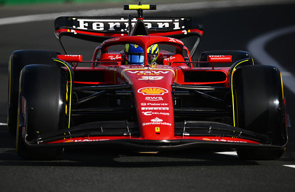 red and black Ferrari race car